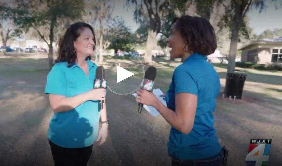 Women is interviewed on camera